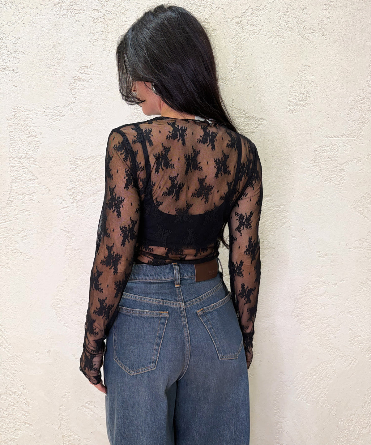 Maglia in pizzo con manicotti