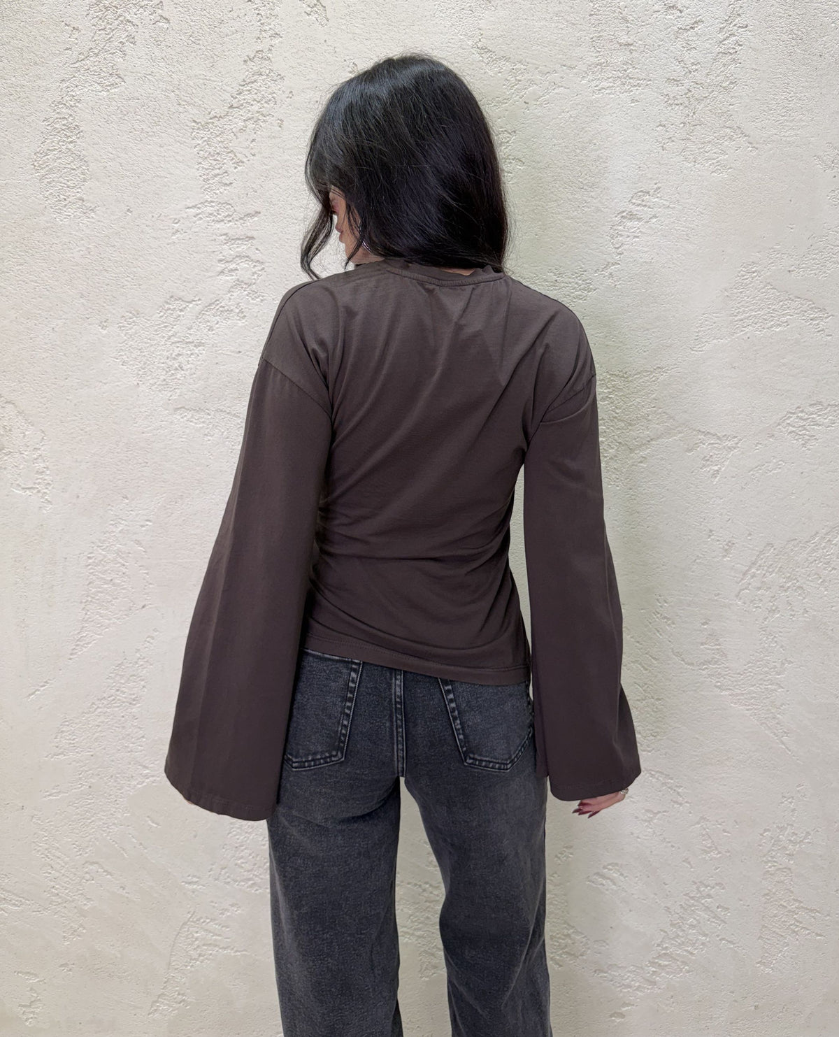Maglia a manica lunga con nodo laterale