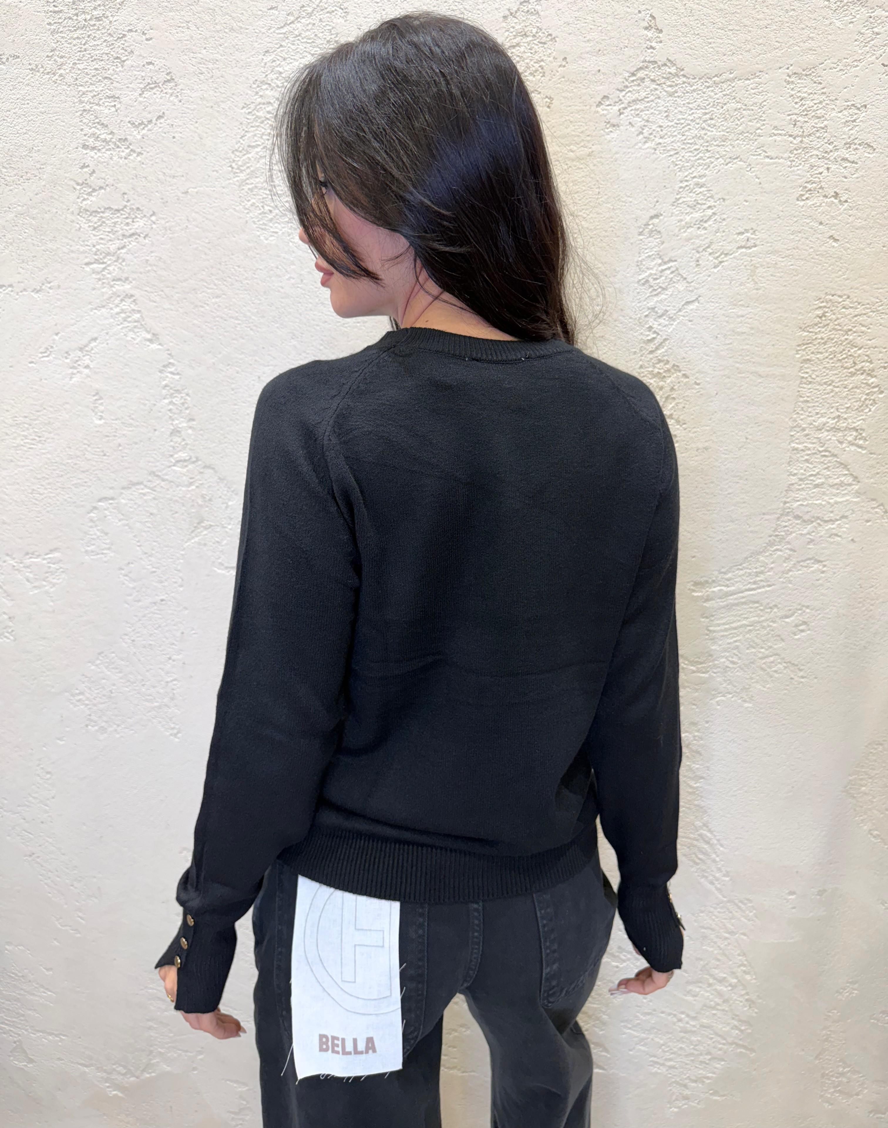 maglia a trecce con bottoncini su polso MGTRECCIA NERO ELEVI