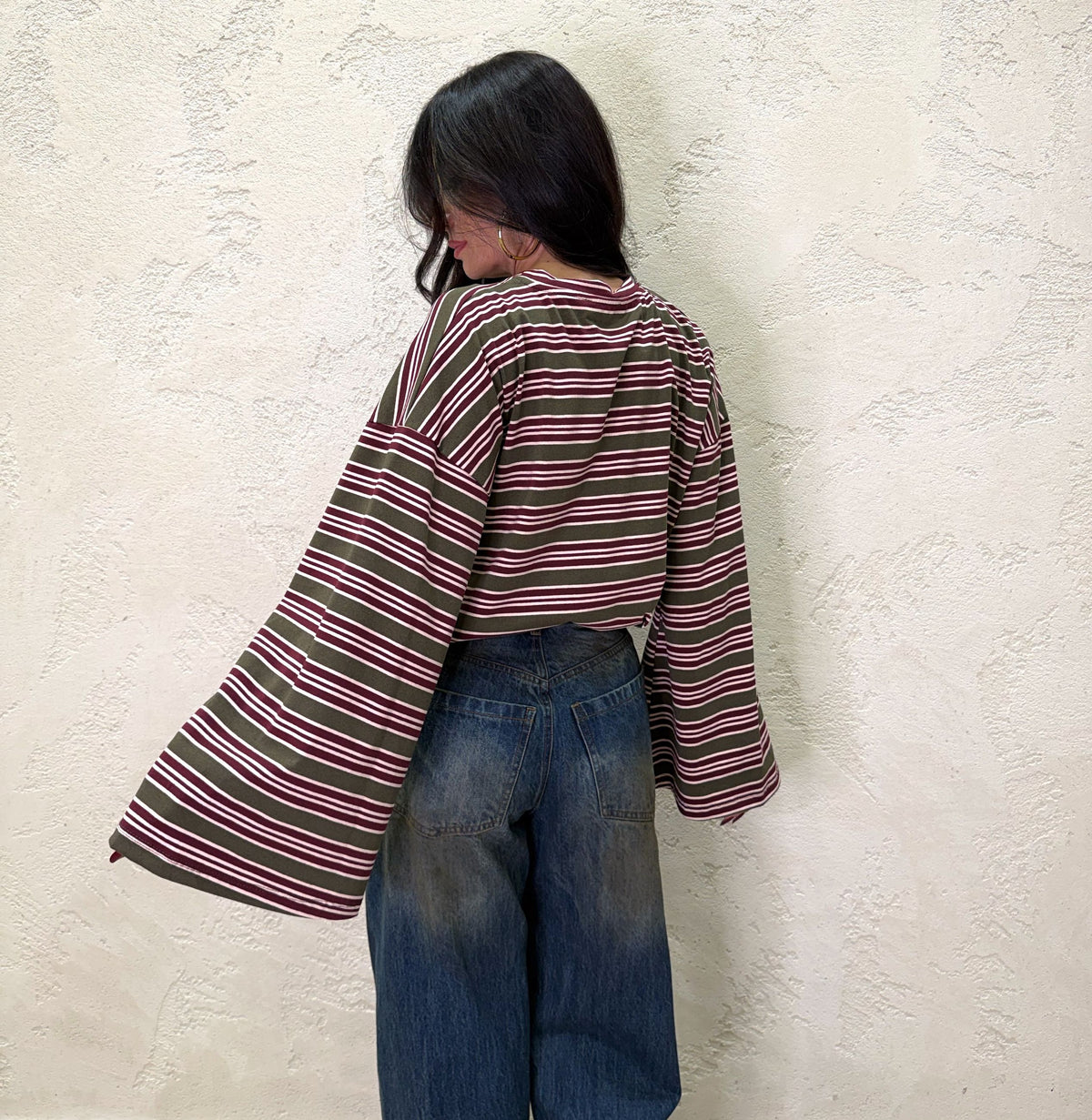 Maglia over a righe con maniche ampie
