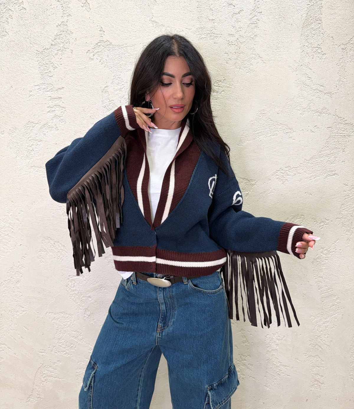 Cardigan con frange in ecopelle