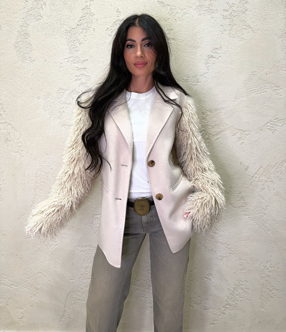 Cappotto con manica bouclé