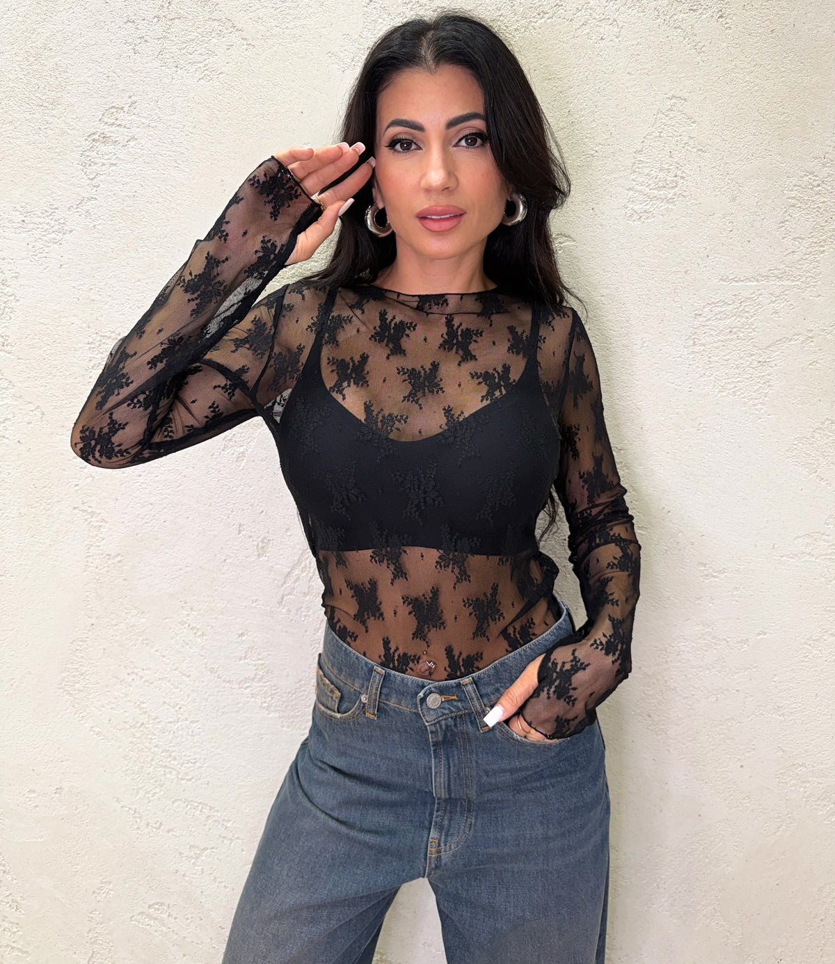 Maglia in pizzo con manicotti