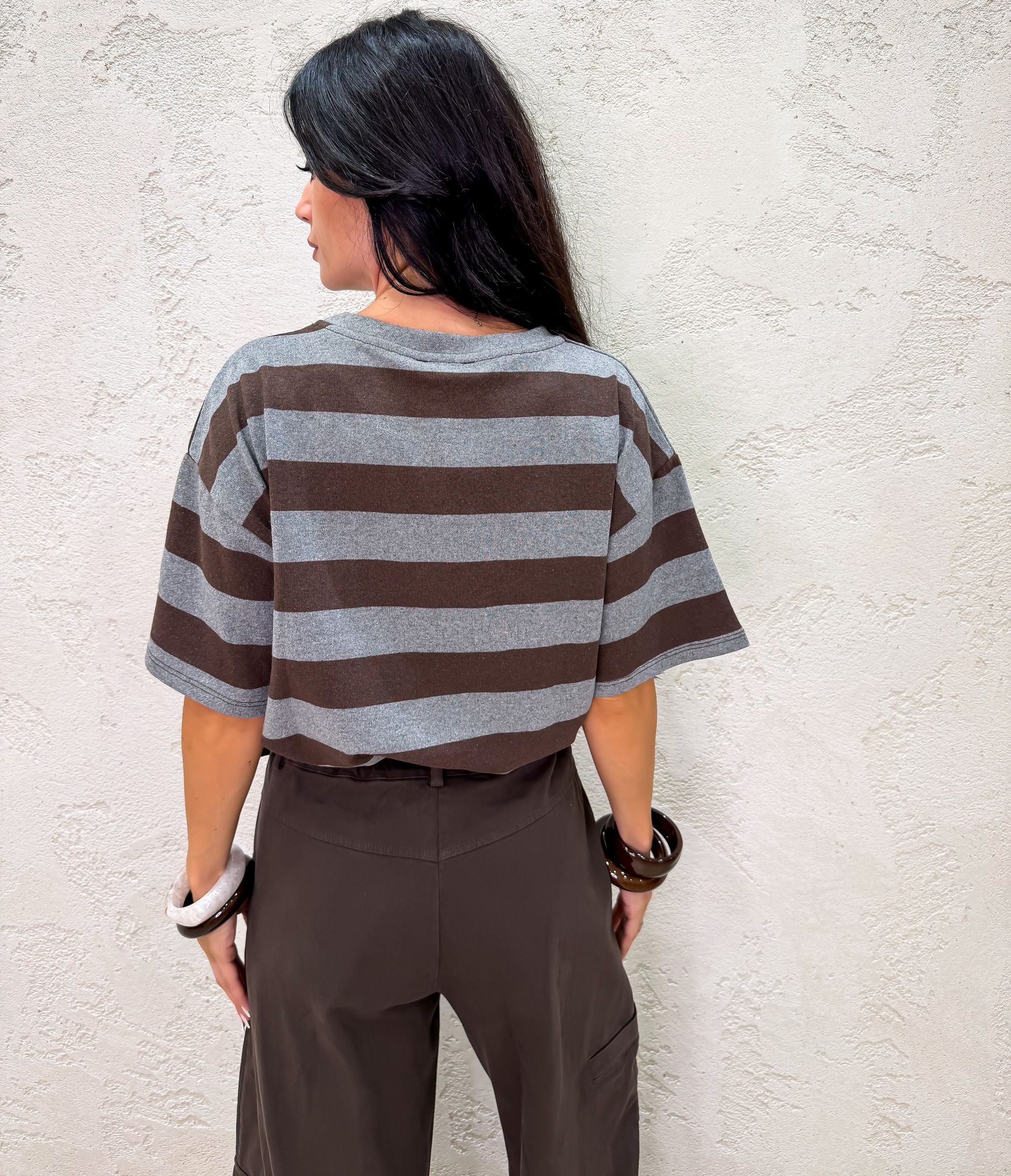 Maglia a righe con tasca pailettes