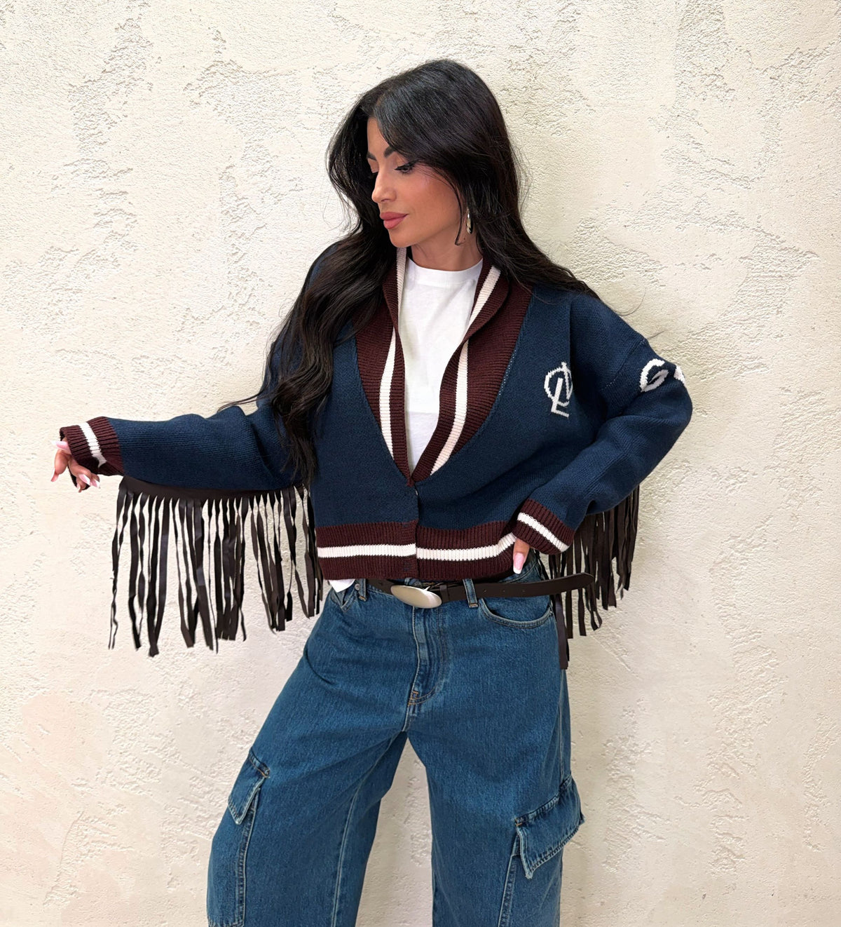 Cardigan con frange in ecopelle