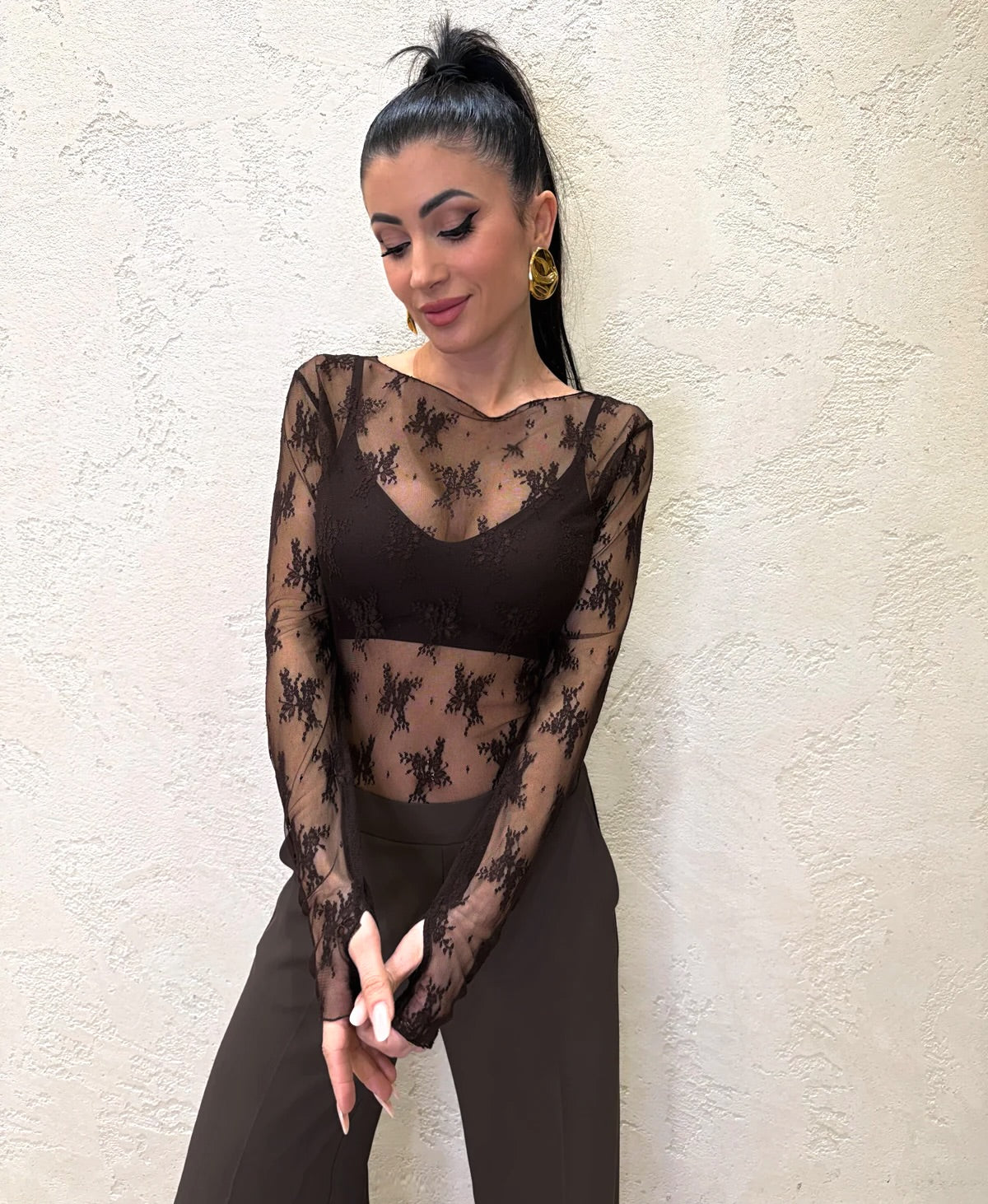 Maglia in pizzo con manicotti