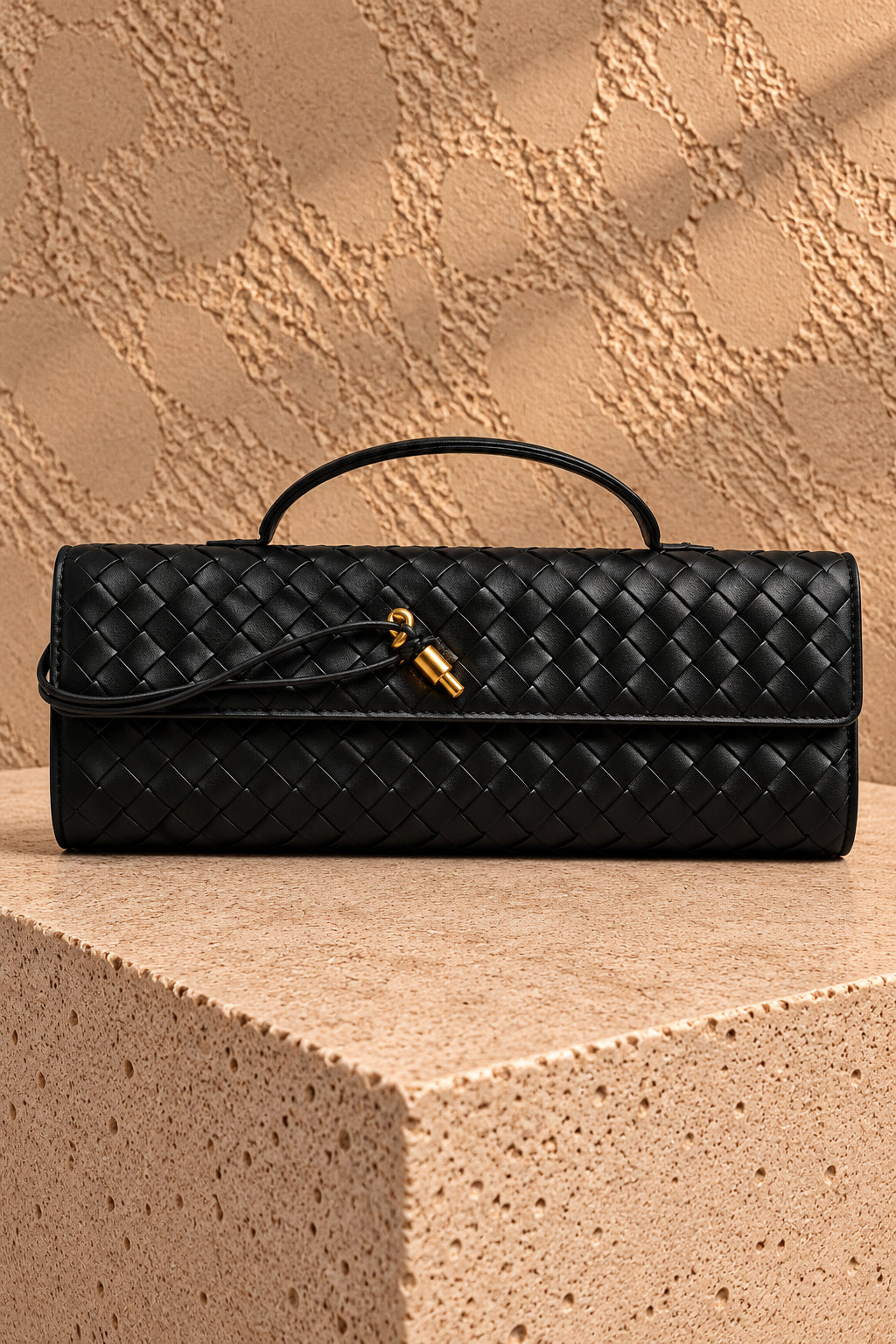 Pochette "Nora" intrecciata
